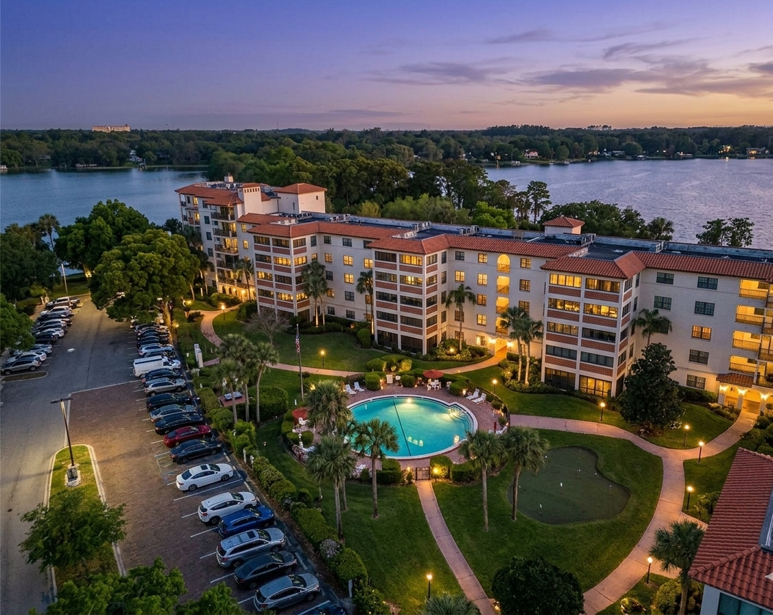 The Cloisters condominium building Winter Park Florida — lakefront pool and Lake Osceola views | Realtor Stephens